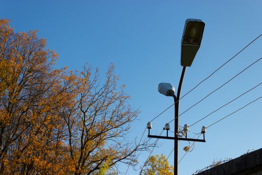 fenc ewith an electricity wire and a barbed wire