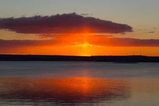 sunrise over the sea and the beach with clear skies