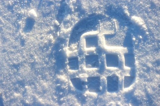 foot prints in fresh snow. close up