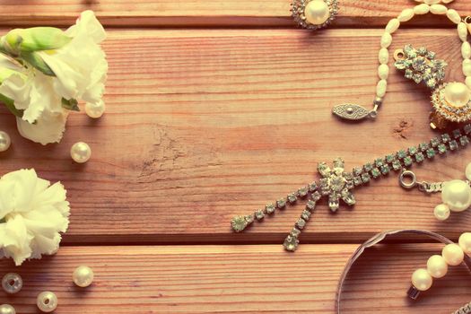 antique vintage silver jewellery on wooden table