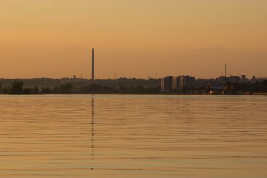 landscape with a pipe. sunset yellow colors