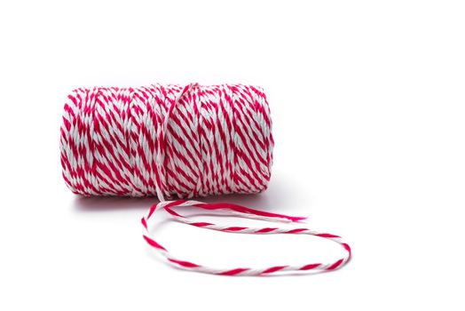 red and white rope roll isolated on white
