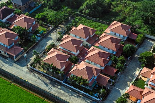 Red roofs in residential area housing, view from the air