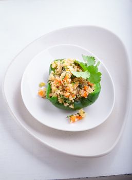 Stuffed green pepper filled with quinoa and vegetables
