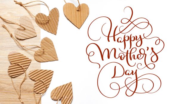 beautiful frame of hearts of kraft paper and text Happy mothers day. Calligraphy lettering hand draw.