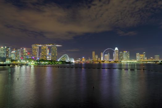 Singapore city skyline with central business district CBD at Marina Bay at night
