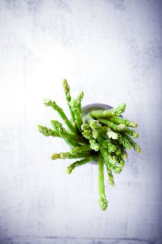 Bundle of fresh green Asparagus on white background
