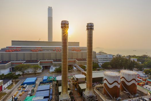 Hong Kong power station at sunset , Glow light of petrochemical industry