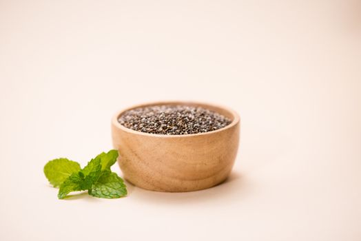 Close-up of raw, unprocessed, dried black chia seeds