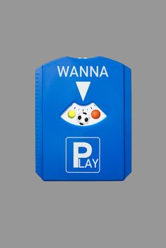 A german parking disc with the words Wanna and Play and sports balls, isolated on grey