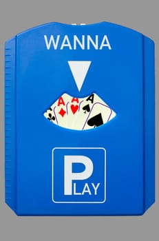 A german parking disc with the words Wanna and Play, isolated on grey