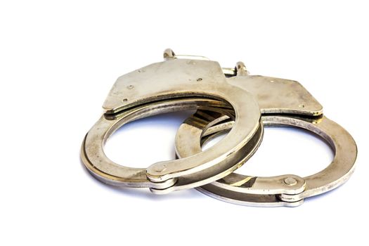shackle,Handcuffs. Steel handcuffs isolated in white background
