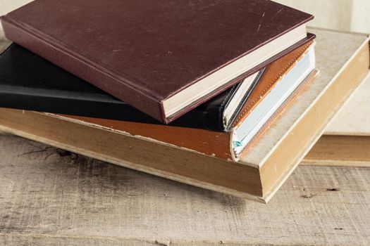 Old books and dusty on wooden floors.