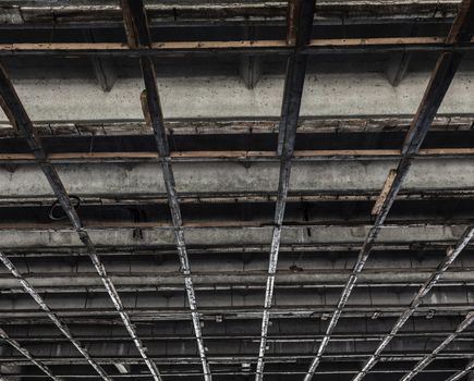 background texture of a concrete ceiling with wooden squares