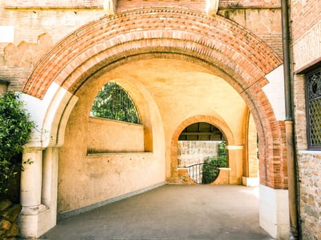 Ancient entrance of a historical building with multiple arches