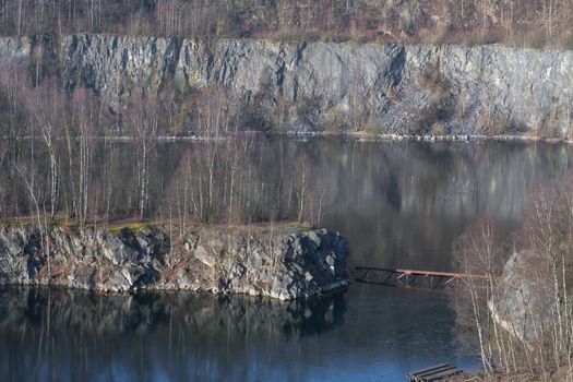 Panoramic view of an old open opencast mine of limestone works in Wuelfrath, Germany on a winter day.