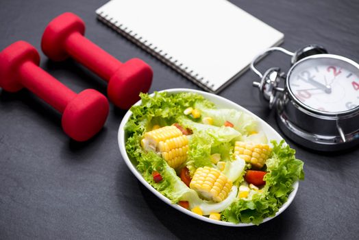 Healthy fitness meal with fresh salad. Diet concept.