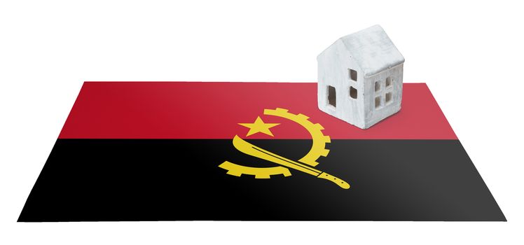 Small house on a flag - Living or migrating to Angola