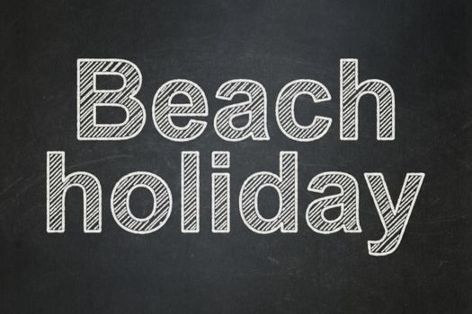 Tourism concept: text Beach Holiday on Black chalkboard background