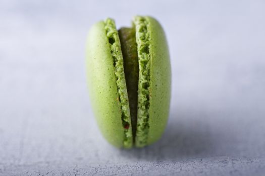 Almond cookies French macaroons on a white surface