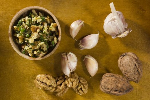 Garlic dip sauce with walnuts and ingredients