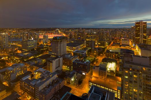 Vancouver British Columbia Canada downtown cityscape during evening blue hour twilight