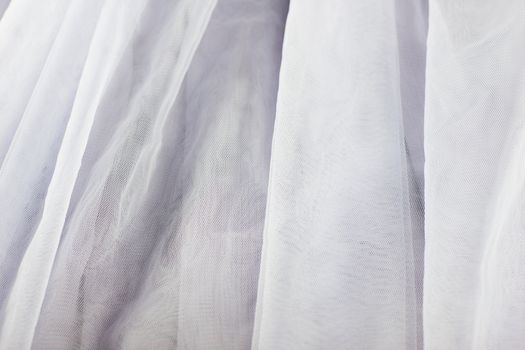 chiffon tulle fabric textured background. pleated skirt fabric texture. closeup plisse fabric texture pattern