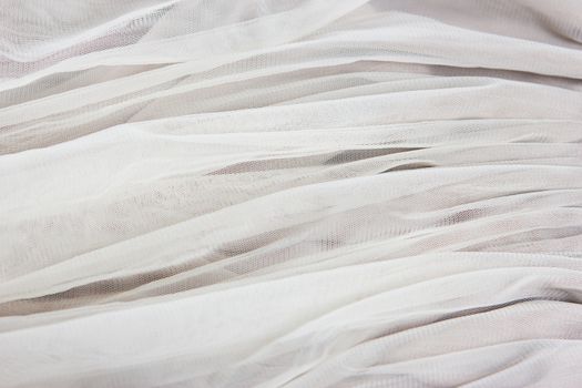 chiffon tulle fabric textured background. pleated skirt fabric texture. closeup plisse fabric texture pattern