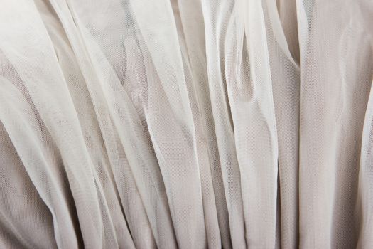 chiffon tulle fabric textured background. pleated skirt fabric texture. closeup plisse fabric texture pattern