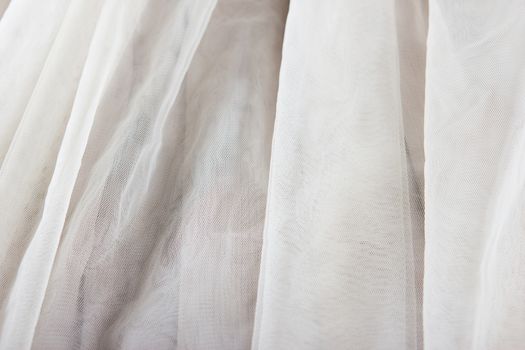 chiffon tulle fabric textured background. pleated skirt fabric texture. closeup plisse fabric texture pattern