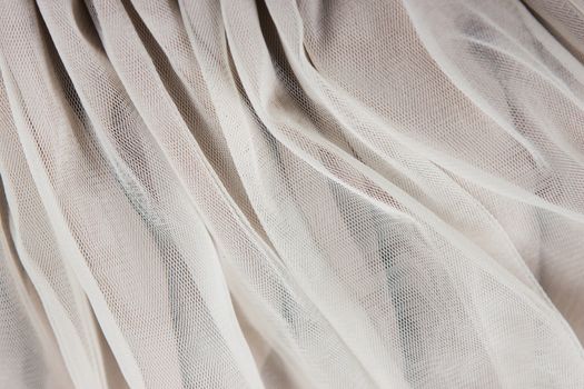 chiffon tulle fabric textured background. pleated skirt fabric texture. closeup plisse fabric texture pattern