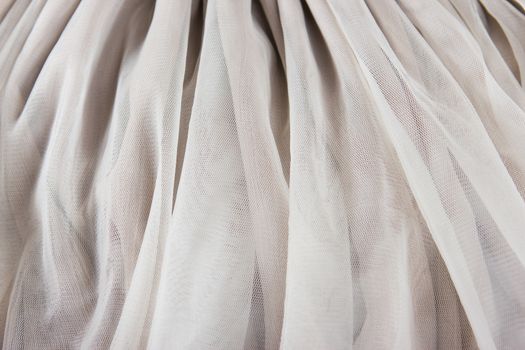 chiffon tulle fabric textured background. pleated skirt fabric texture. closeup plisse fabric texture pattern