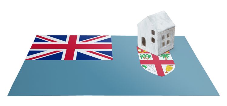 Small house on a flag - Living or migrating to Fiji