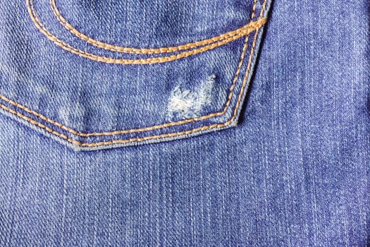 Jeans close-up, old, pocket back, front crumpled ragged
