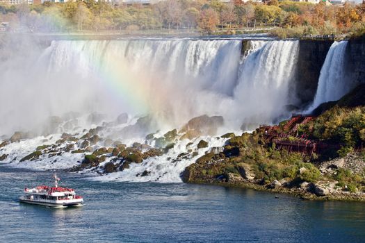 Beautiful background with amazing Niagara waterfall US side and a ship