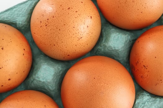 View of opened box of chicken eggs for market place