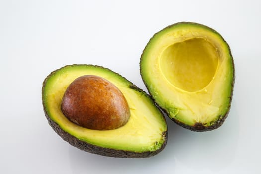 Fresh avocado on white background. Selective focus