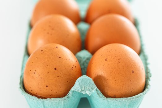 View of opened box of chicken eggs for market place