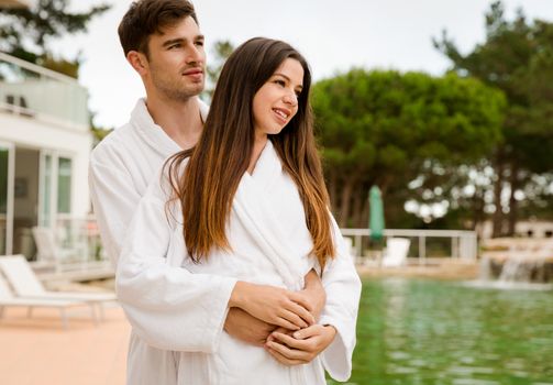 Young couple enjoying vacations in a hotel