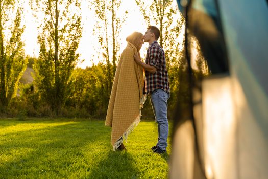 Young couple in love after waking up in the nature