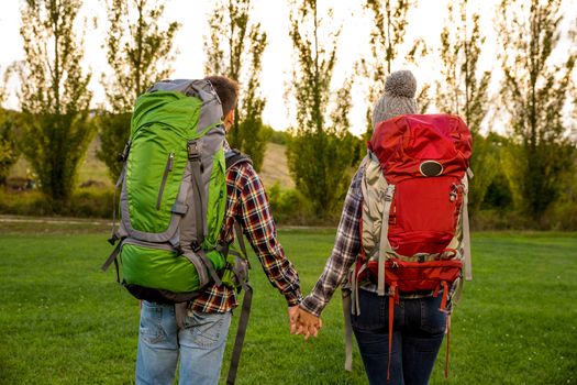 Shot of a young couple with backpacks ready for camping