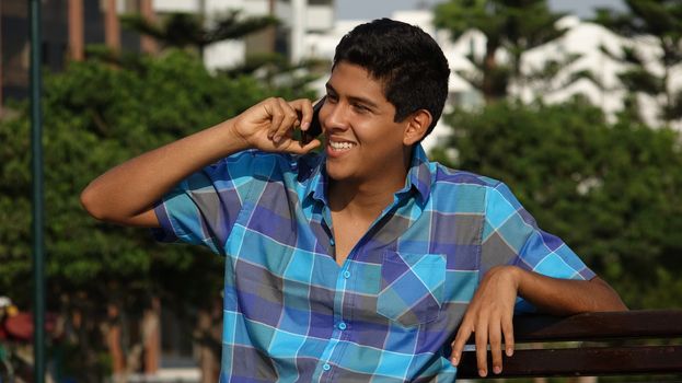 Happy Teen Using Cell Phone