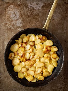 close up of rustic golden german pan fried potato bratkartofflen