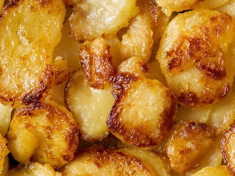 close up of rustic golden german pan fried potato bratkartofflen food background