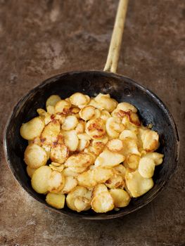close up of rustic golden german pan fried potato bratkartofflen