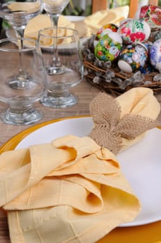 decorate the Easter table decoratively folded napkins in the form of a hare