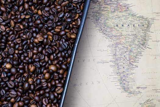 South America coffee map near coffee beans