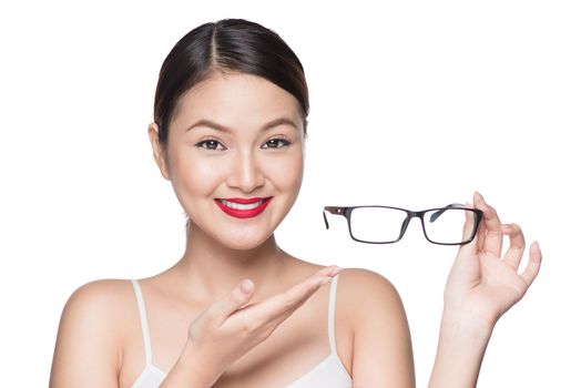 Proposing product. Beauty asian girl showing glasses