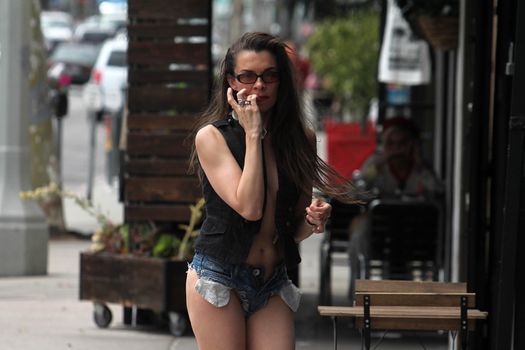 Alicia Arden the "Baywatch" actress is spotted wearing a barely-there outfit while shopping on Melrose Ave. on a hot day, and has a run-in with a homless man, Los Angeles, CA 05-03-17
