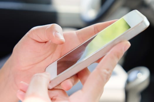 close up of using mobile smart phone